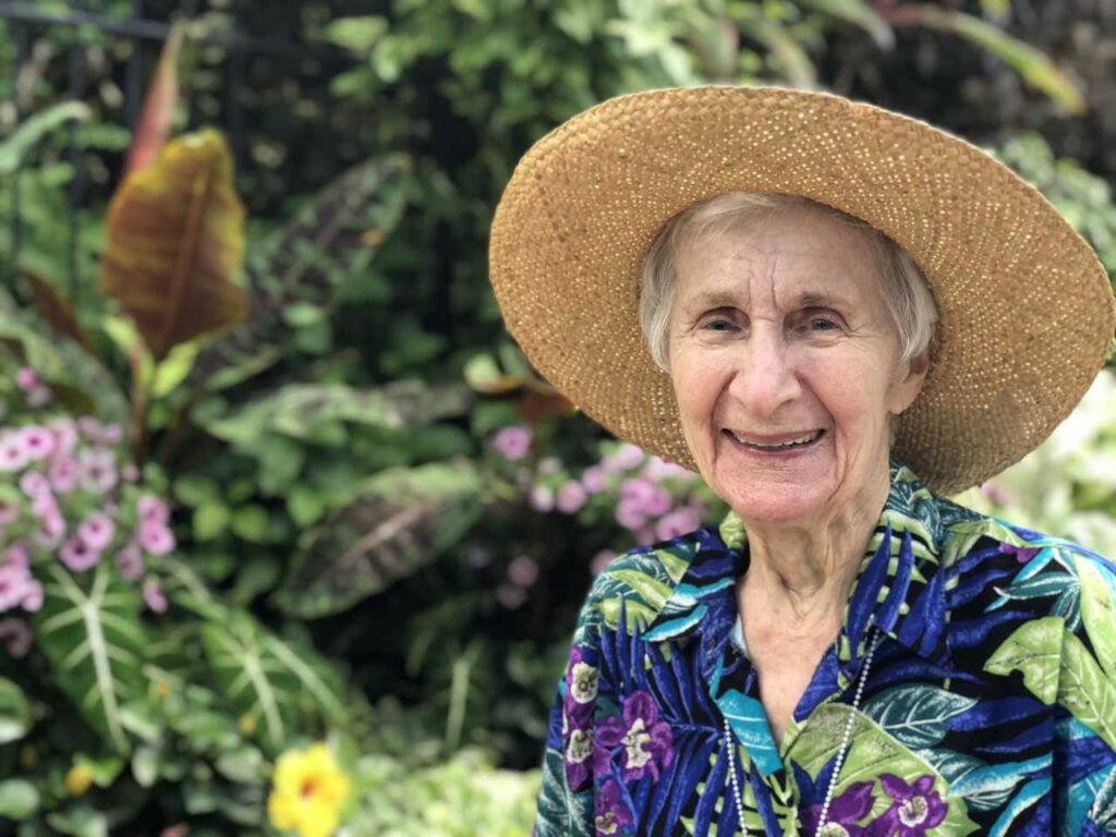 Elderly woman smiling warmly in portrait