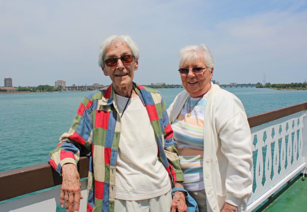 Group of people smiling in casual outdoor photo