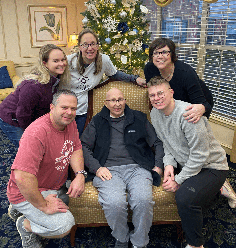 Elderly man smiling outdoors standing in casual wear