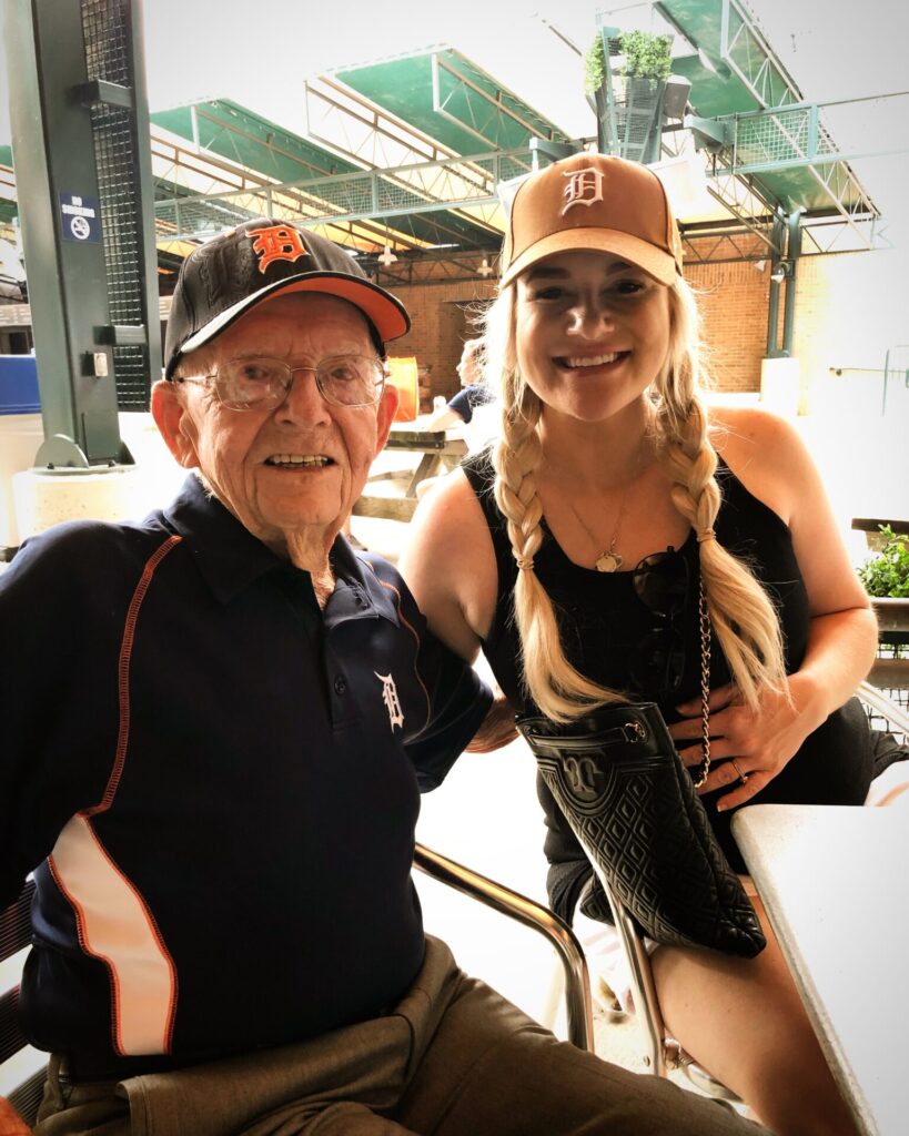 Family group posing in formal indoor setting