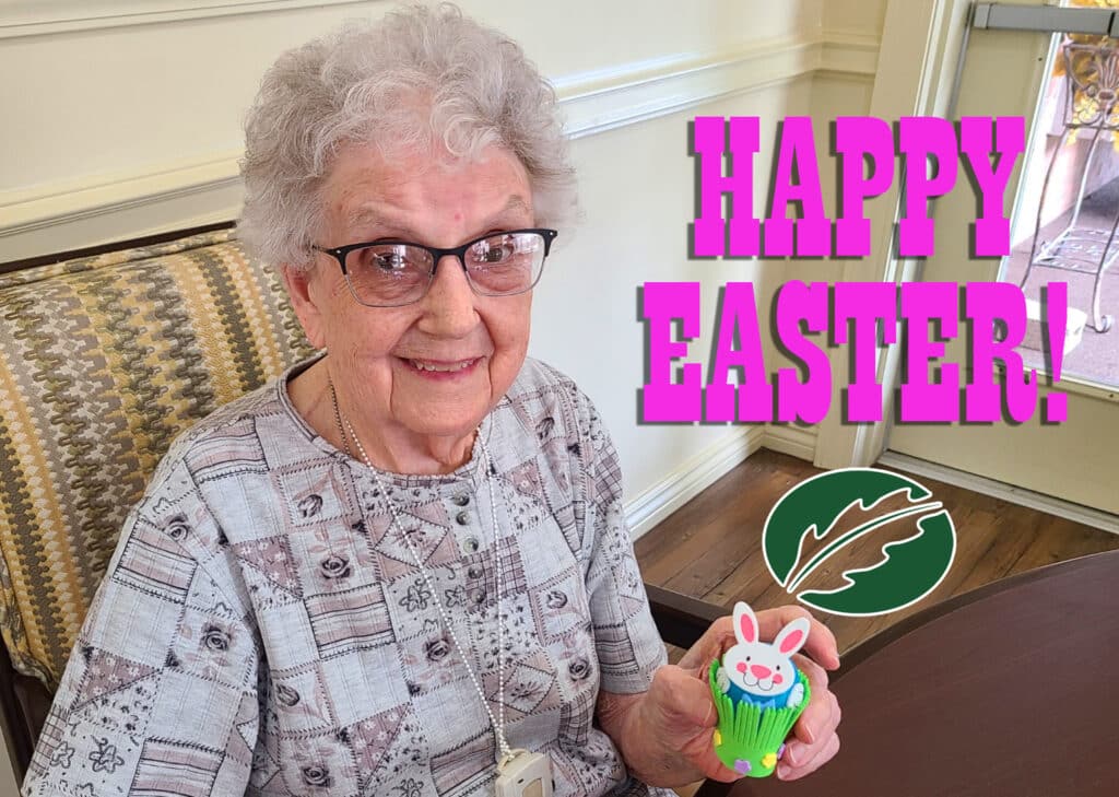 Senior woman holding Easter decoration with Happy Easter text overlay