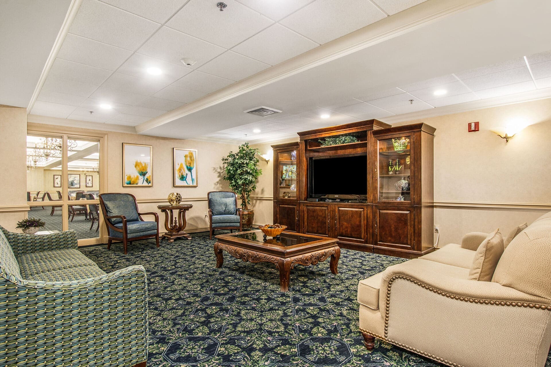 Apartment bedroom at Parkway with bed, nightstand, and lamp