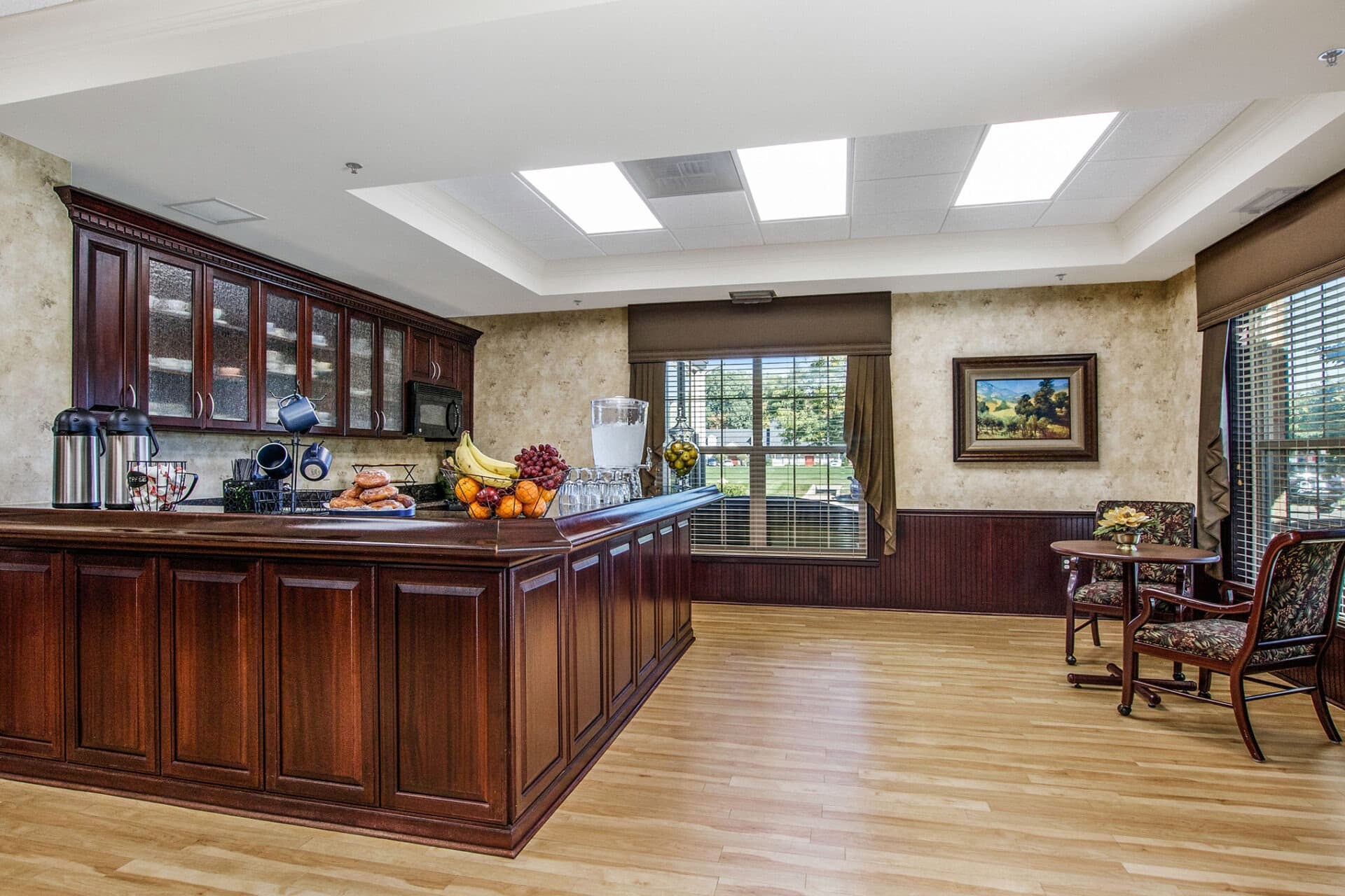 Community kitchen at Parkway with cabinets and modern appliances