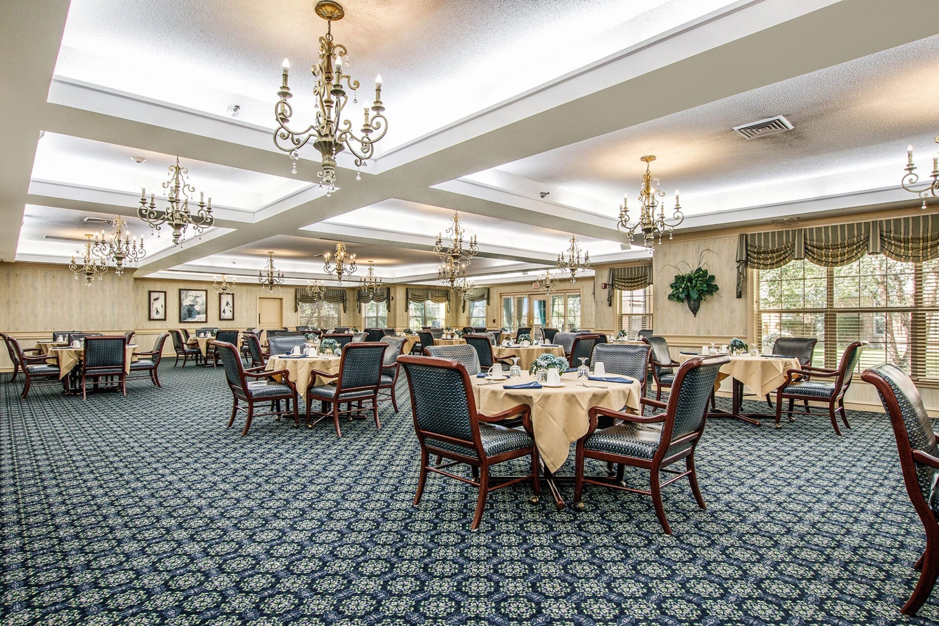 Bright corridor at Parkway with patterned carpet and seating area