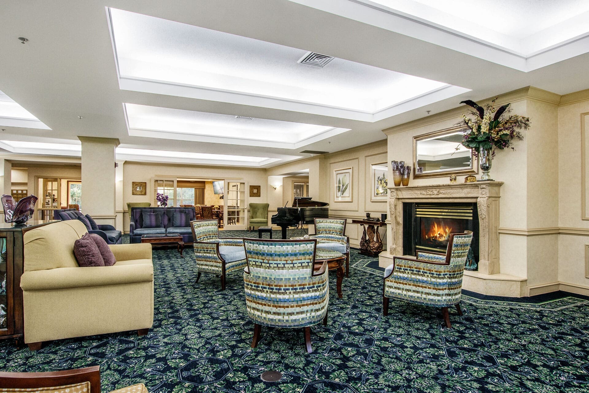 Fireplace lounge at Parkway with seating and warm atmosphere