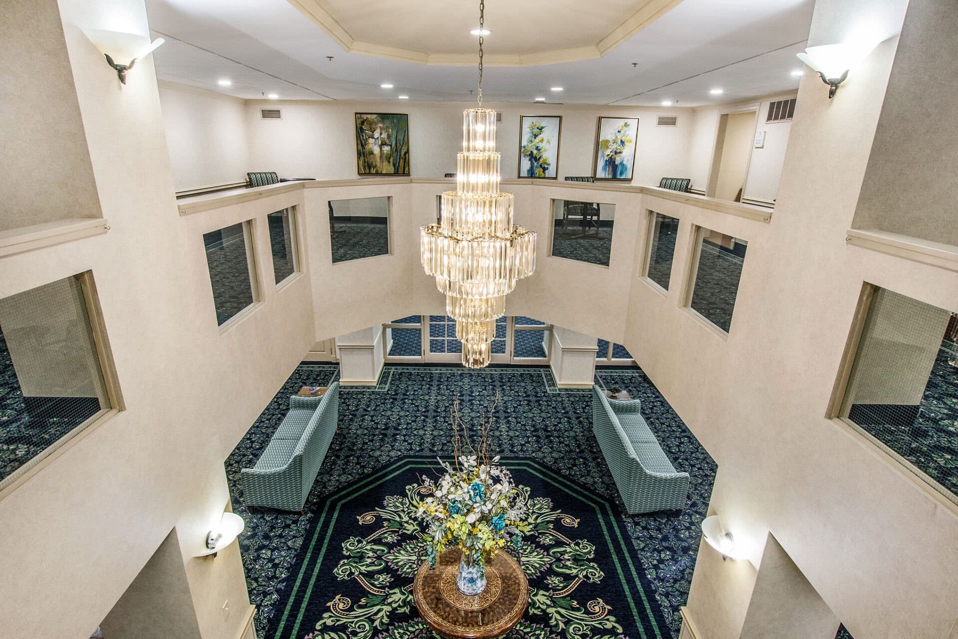 Grand atrium at Parkway featuring chandelier and decorative flooring