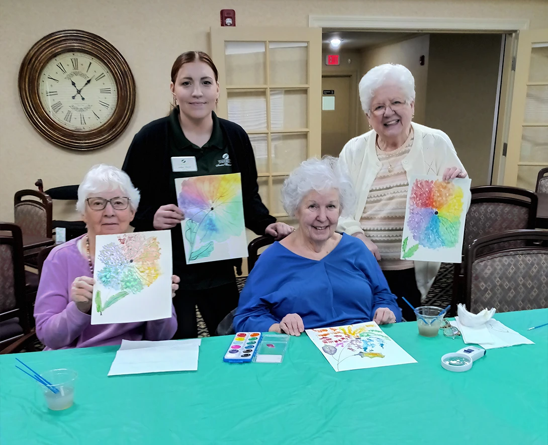Senior ladies painting at Oakmont Communities